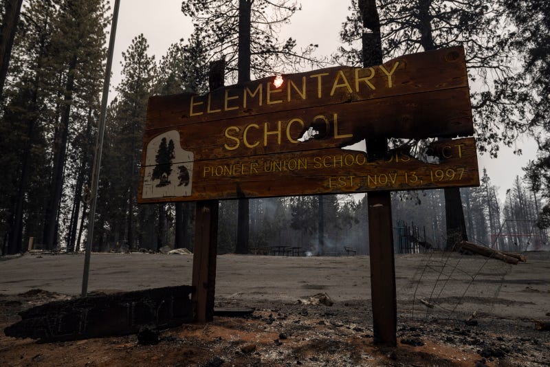Charred elementary school sign in Caldor Fire