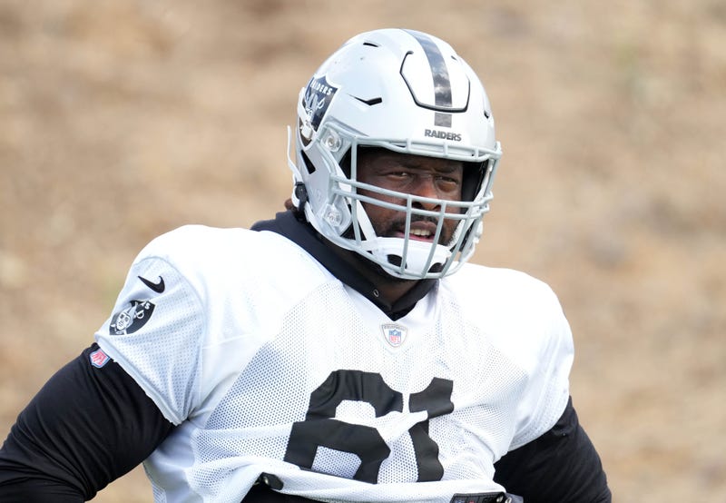 Las Vegas Raiders defensive tackle Gerald McCoy (61) looks on during a joint practice against the Los Angeles Rams.