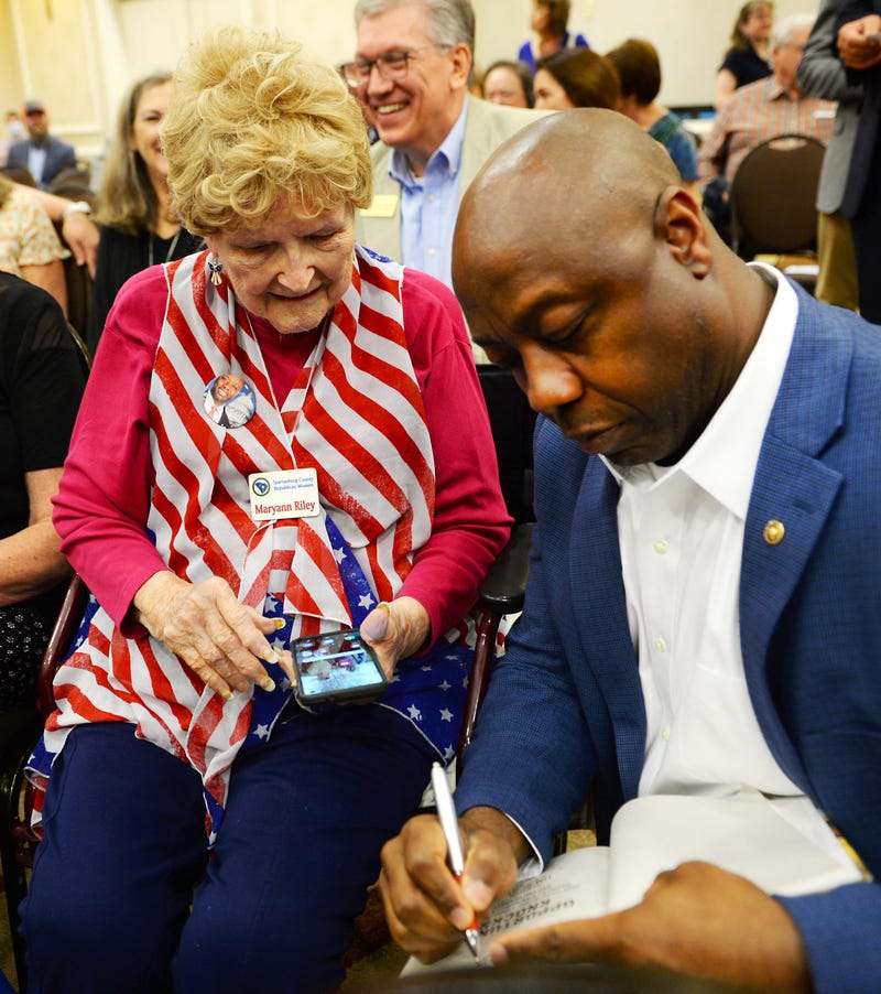 Tim Scott writing a book