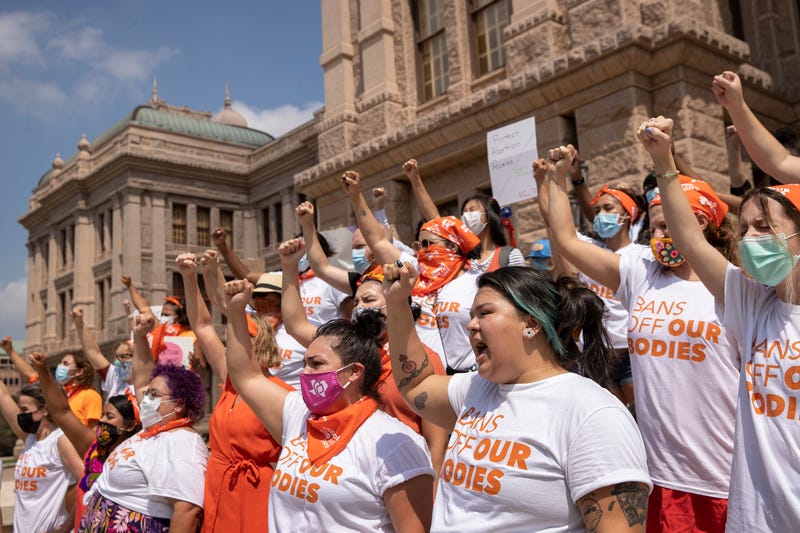 Women protest abortion ban on steps of Capitol in Austin