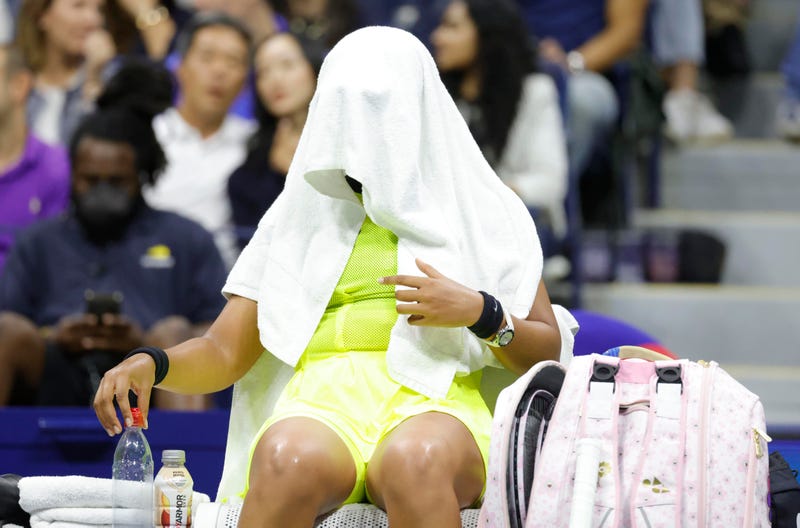 Sep 3, 2021; Flushing, NY, USA; Naomi Osaka of Japan covers her head with a towel during a change of ends against Leylah Fernandez of Canada in a third round match on day five of the 2021 U.S. Open tennis tournament at USTA Billie Jean King National Tennis Center.
