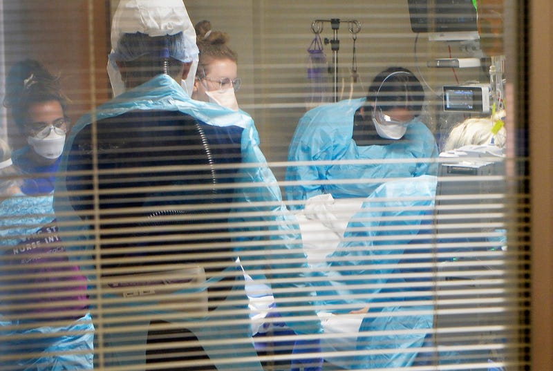 UPMC staff deal with a COVID patient 