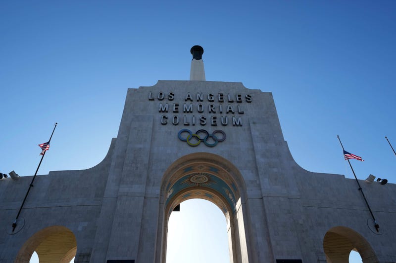 File photo showing a general overall view of the Los Angeles Memorial Coliseum peristyle and Olympic torch on Sept. 11, 2021.