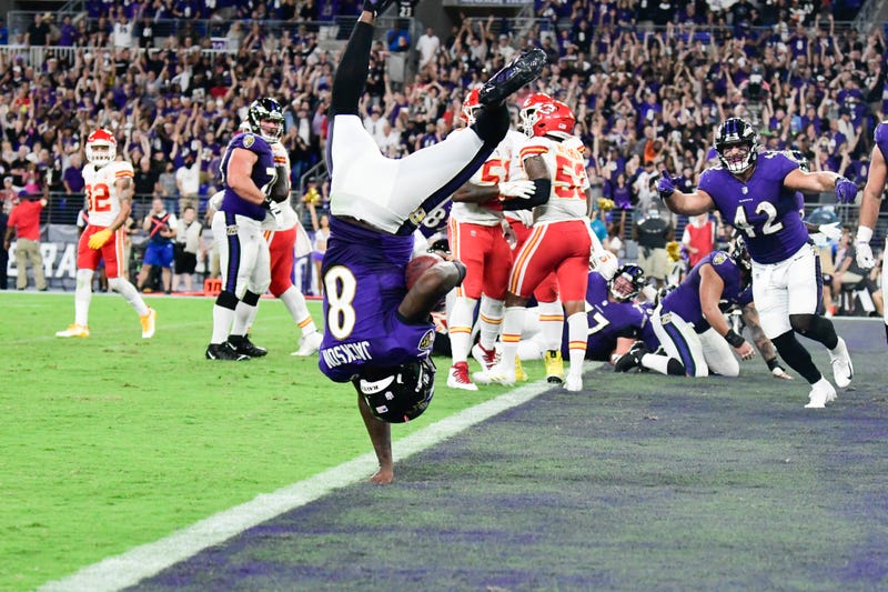 Lamar Jackson somersaults into the endzone