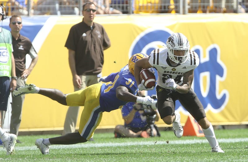 Western Michigan Broncos wide receiver Skyy Moore (24) runs after a pass reception past Pittsburgh Panthers defensive back Erick Hallett (31) during the second quarter at Heinz Field.