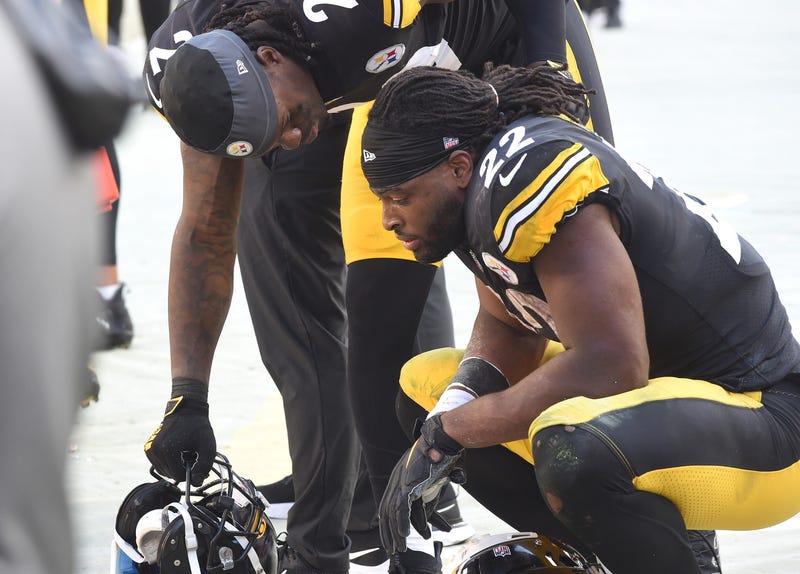 Najee Harris being consoled