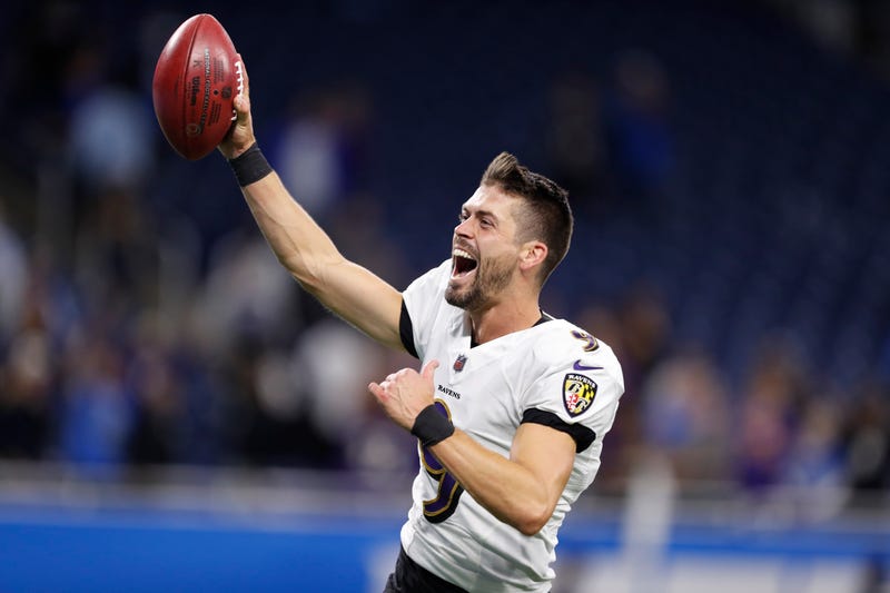 Justin Tucker celebrates his game-winning 66 yard field goal