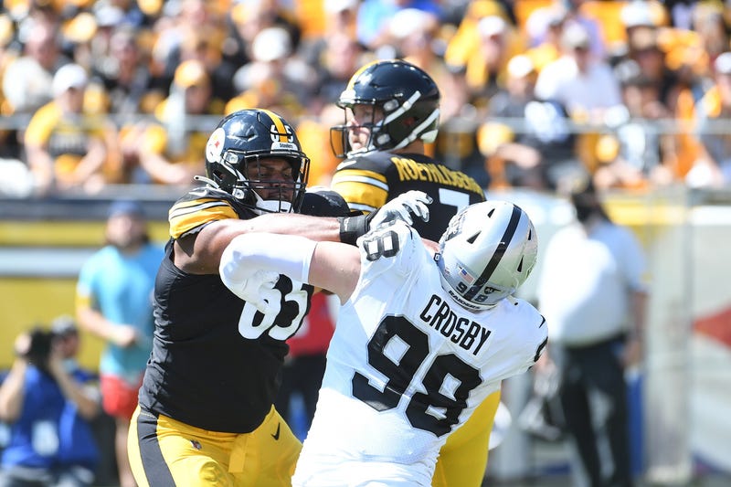 Steelers offensive tackle Dan Moore blocks