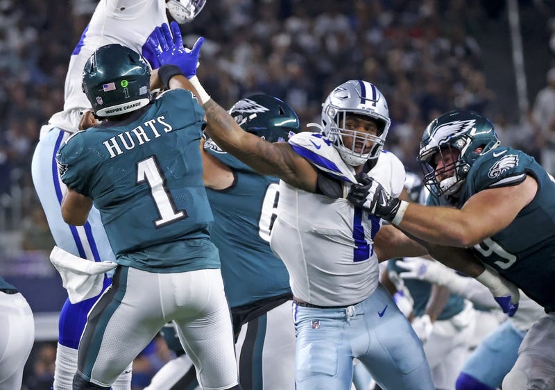 Dallas Cowboys linebacker Micah Parsons (11) rushes Philadelphia Eagles quarterback Jalen Hurts (1)