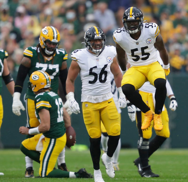 Devin Bush with Alex Highsmith