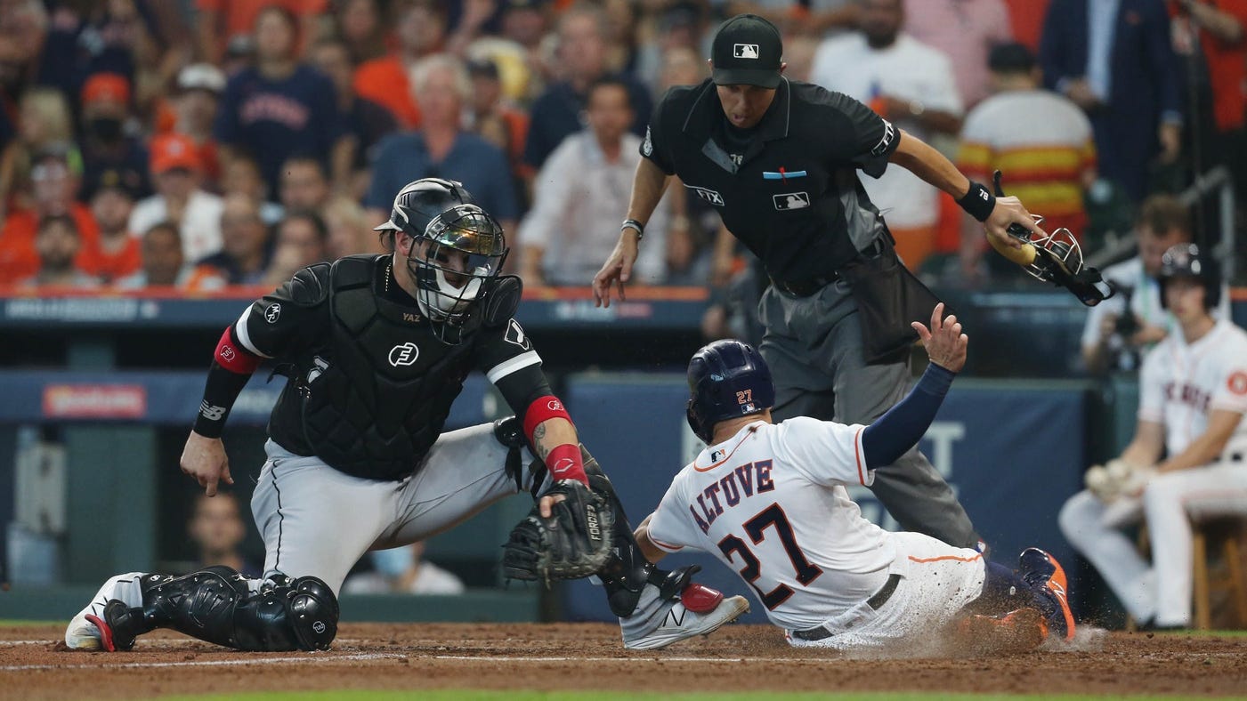 Watch Astros' Jose Altuve slide into home plate in Game 1 of ALDS