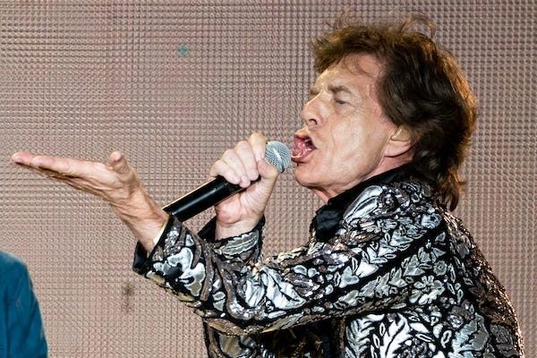Mick Jagger singing during concert