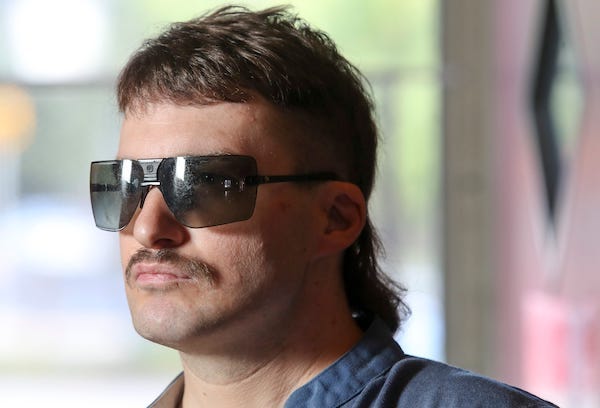 Christopher Devitt and his mullet at the Jackson Inn, where he bartends,
