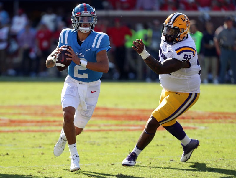 Oct 23, 2021; Oxford, Mississippi, USA; Mississippi Rebels quarterback Matt Corral (2) runs the ball during the first half against the LSU Tigers at Vaught-Hemingway Stadium.