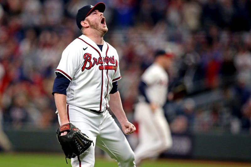 Oct 23, 2021; Cumberland, Georgia, USA; Atlanta Braves relief pitcher Tyler Matzek (68) reacts after striking out three batters with the bases loaded during the seventh inning against the Los Angeles Dodgers in game six of the 2021 NLCS at Truist Park. 