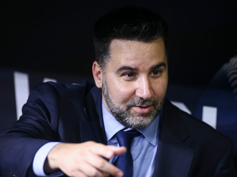Oct 25, 2021; Houston, Texas, USA; Atlanta Braves general manager Alex Anthopoulos talks in the dugout during workouts before Game 1 of the World Series between the Houston Astros and the Atlanta Braves at Minute Maid Park.
