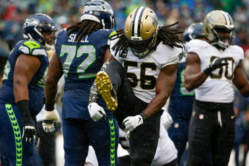 Saints linebacker Demario Davis celebrates