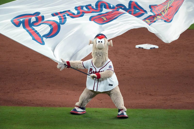 Oct 30, 2021; Atlanta, Georgia, USA; Atlanta Braves mascot Blooper celebrates after defeating the Houston Astros in game four of the 2021 World Series at Truist Park.