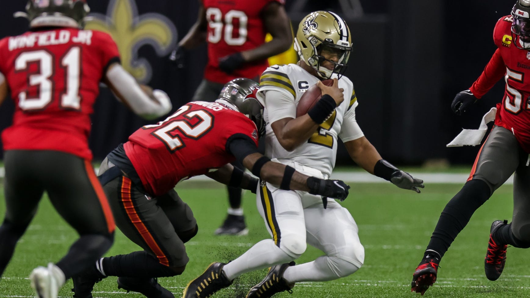 Saints QB Jameis Winston hurt on horsecollar tackle; Trevor Siemian takes over