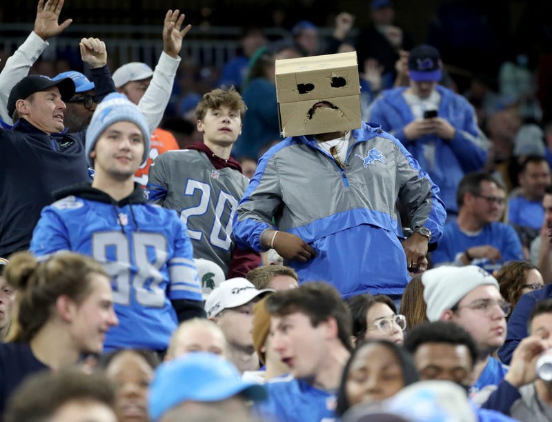 Lions fans puts a box on his head in reaction to another bad play against the Eagles during the second half of the Lions' 44-6 loss at Ford Field on Sunday, Oct. 31, 2021. 