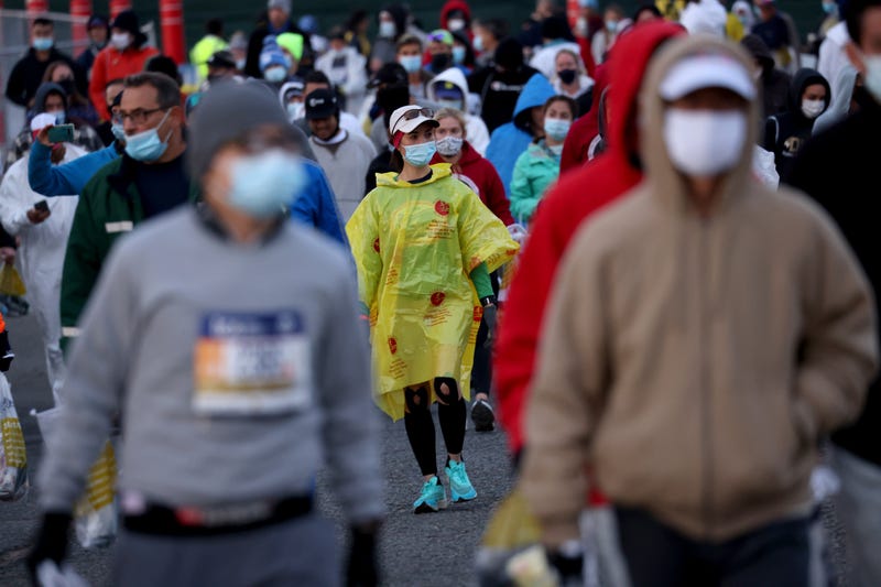 Runners wear whatever will keep them warm at the Start Village of the New York City Marathon. Sunday, November 7, 2021.
