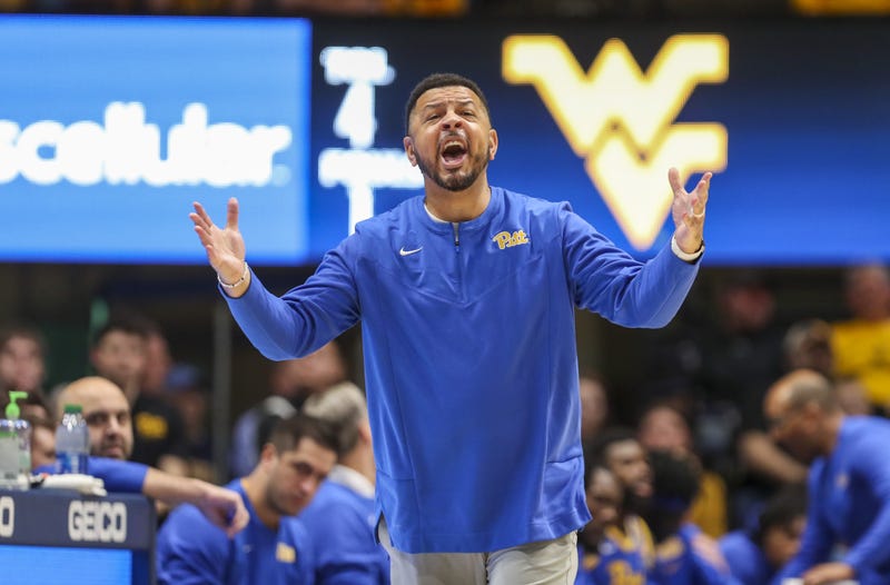 Pittsburgh Panthers head coach Jeff Capel III yells from the bench during the first half against the West Virginia Mountaineers at WVU Coliseum.