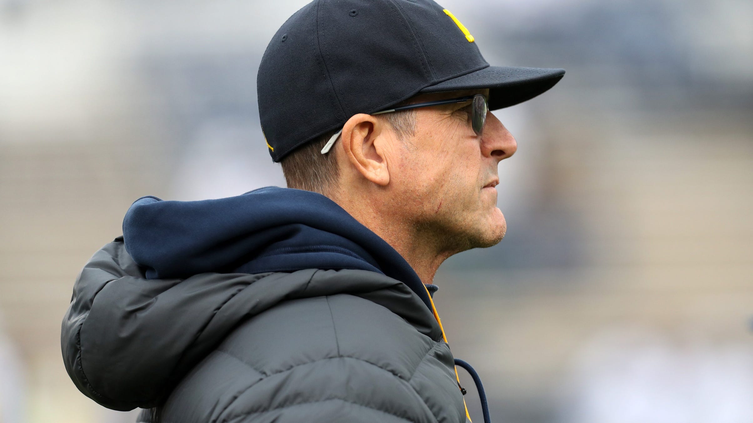 Jim Harbaugh says he's back at Michigan for good