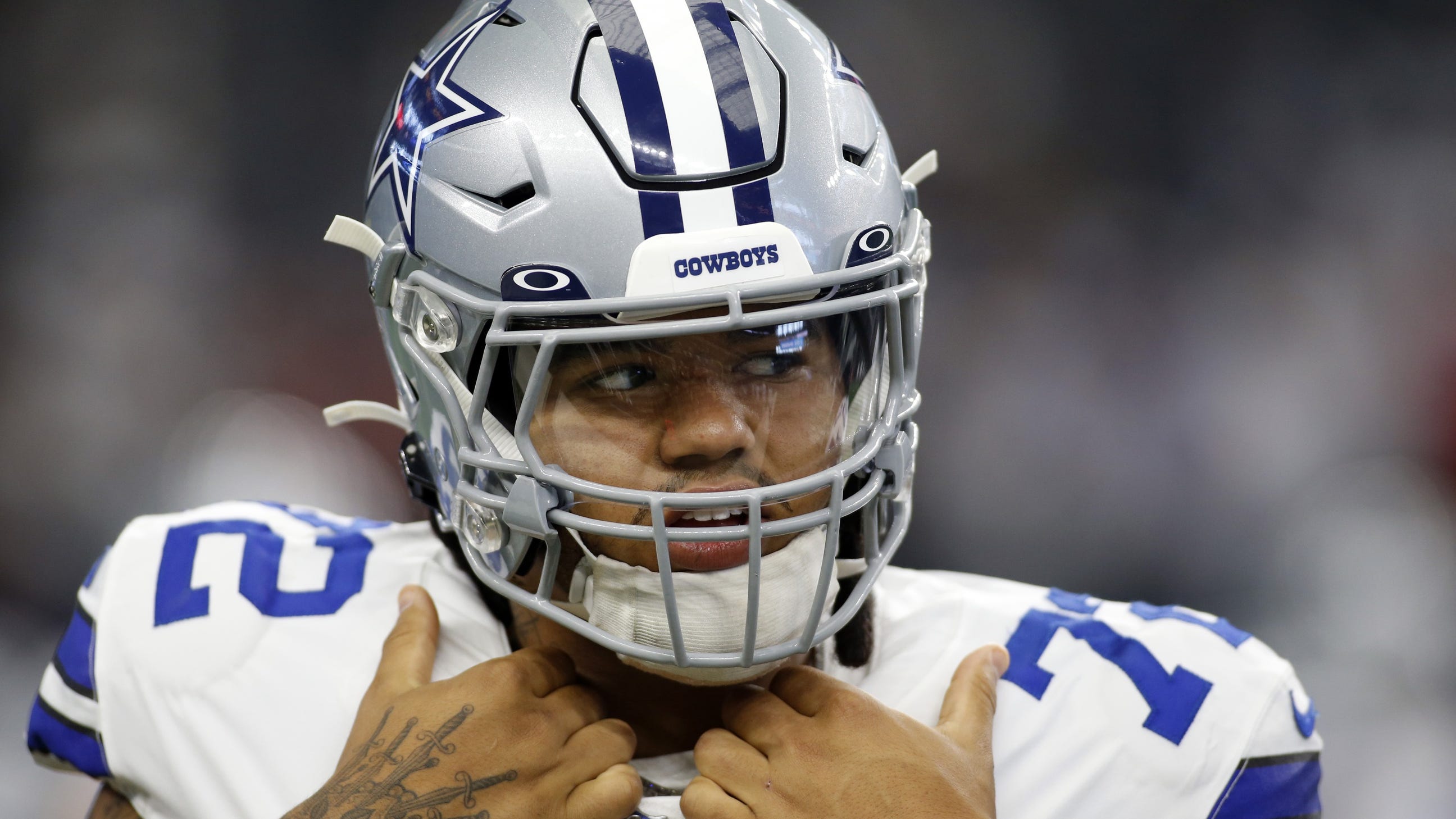 Cowboys' Trysten Hill suspended 2 games for punching Raiders' lineman