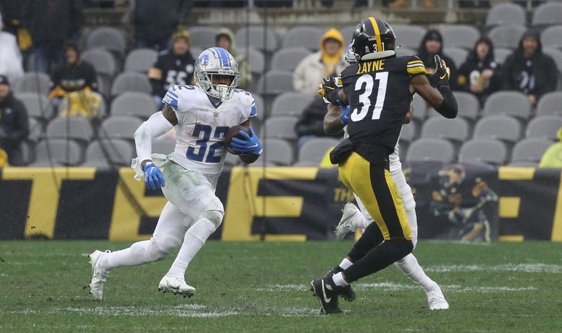D'Andre Swift running w Justin Layne in picture