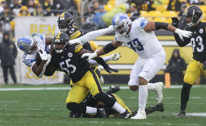 Steelers inside linebacker Devin Bush (55) tackles Detroit Lions running back Godwin Igwebuike (35)