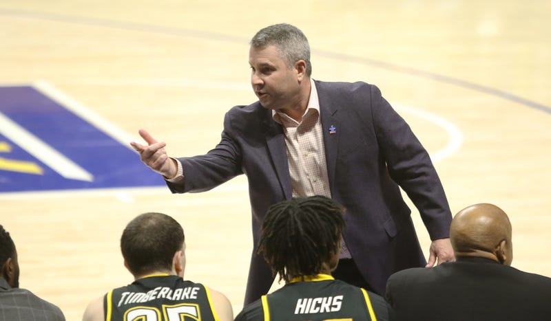 Towson Tigers head coach Pat Skerry gestures to the Tigers bench against the Pittsburgh Panthers during the first half at the Petersen Events Center.