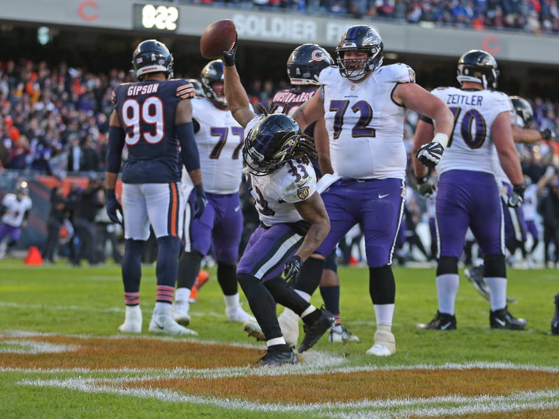Devonta Freeman spikes the ball after scoring the game-winning TD