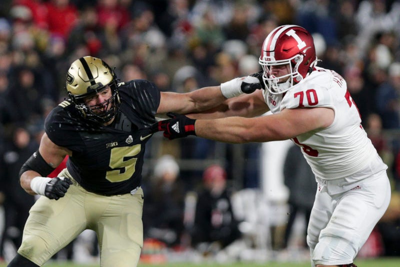 Indiana offensive lineman Luke Haggard (70) blocks Purdue defensive end George Karlaftis (5) during the third quarter of an NCAA college football game, Saturday, Nov. 27, 2021 at Ross-Ade Stadium in West Lafayette.