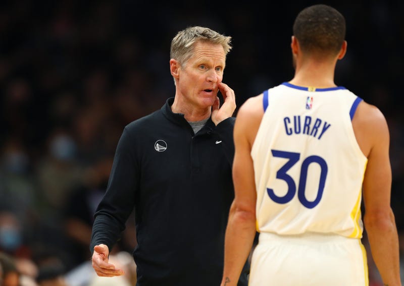 Golden State Warriors head coach Steve Kerr with guard Stephen Curry (30)