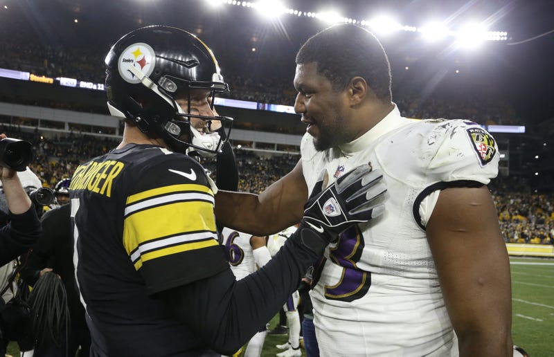 Big Ben greets Calais Campbell at midfield