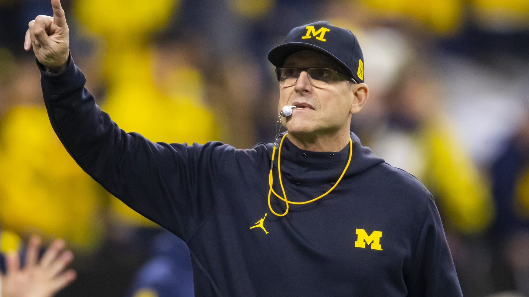 Jim Harbaugh said 'no big deal' to major pay cut: "It's just money"