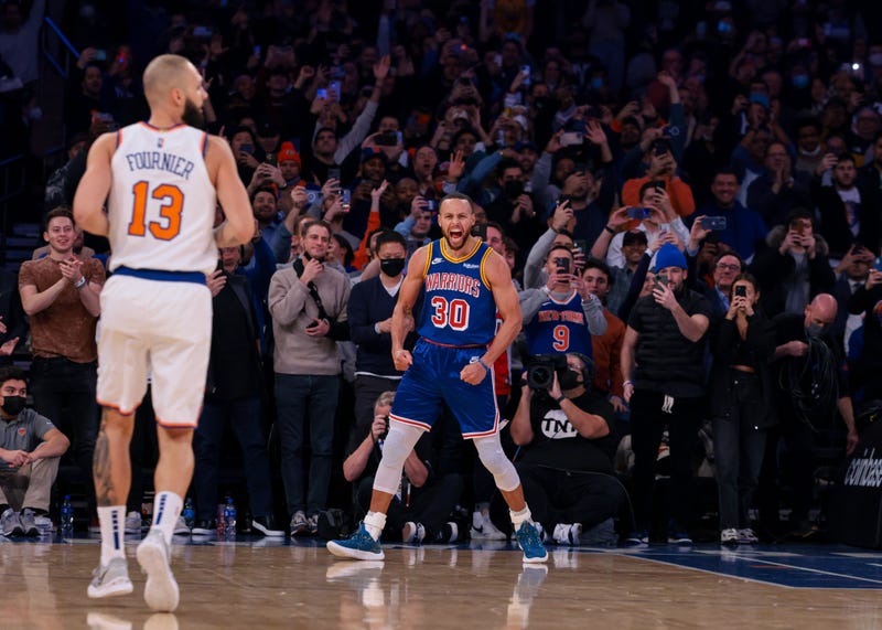 Golden State's Steph Curry celebrates breaking the career 3-pt FG record