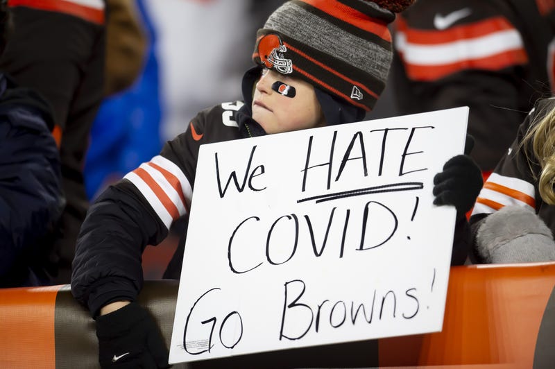  A young Cleveland Browns fan holds a sign during