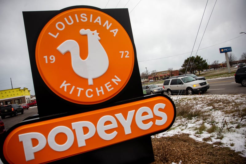 A Popeye's fast food restaurant with drive thru