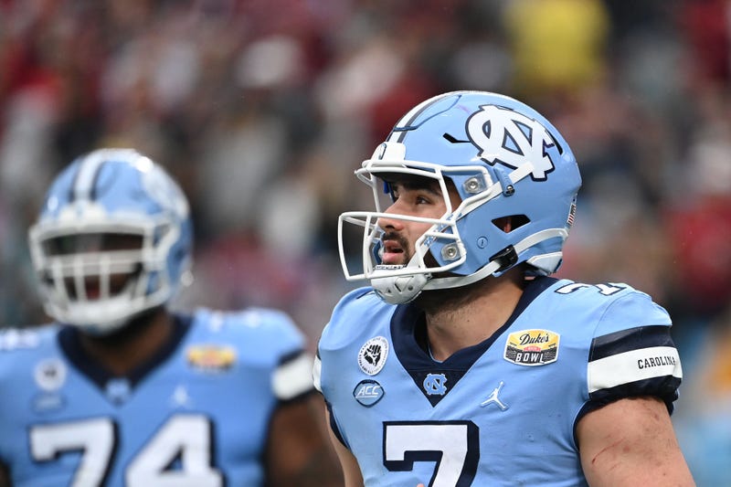 North Carolina Tar Heels quarterback Sam Howell (7) on the field in the third quarter during the 2021 Duke's Mayo Bowl
