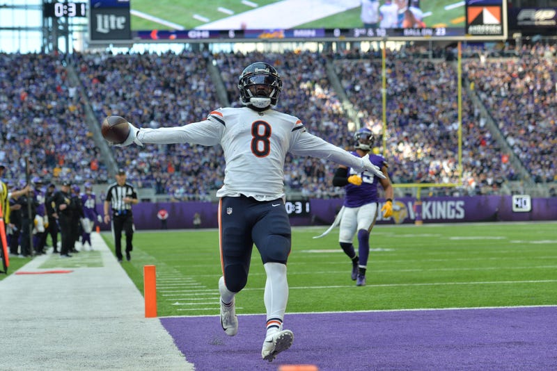 Jan 9, 2022; Minneapolis, Minnesota, USA;Chicago Bears running back Damien Williams (8) catches a 23 yard touchdown pass from quarterback Andy Dalton (not pictured) as Minnesota Vikings outside linebacker Anthony Barr (55) looks on during the second quarter at U.S. Bank Stadium. 