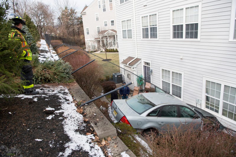 Police said the sedan veered off the Garden State Parkway when the driver lost control
