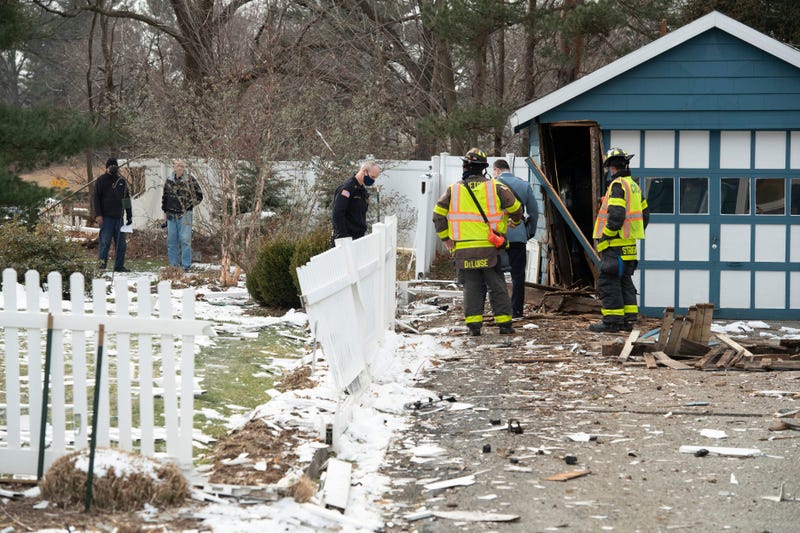 It also appears the sedan struck a garage