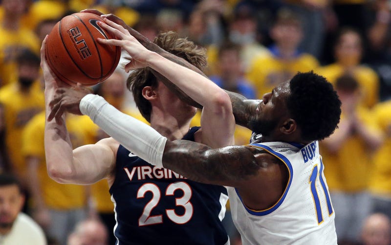 Jamarius Burton fouling Virginia player