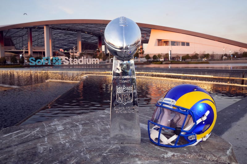 FILE - Vince Lombardi trophy and Los Angeles Rams helmet at SoFi Stadium.
