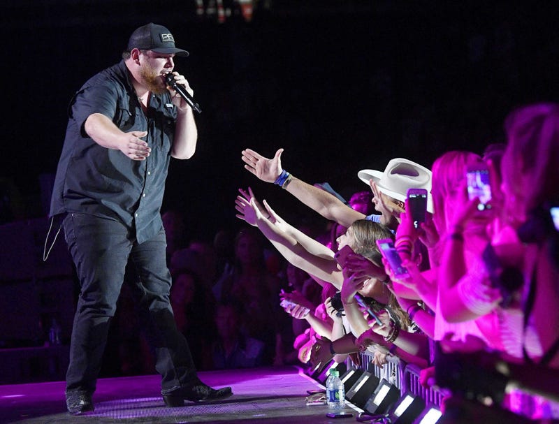 Luke Combs interacts with fans during the 2018 CMA Music Festival at Nissan Stadium