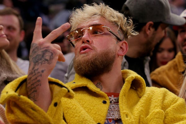 Jake Paul gestures at a fan during the third quarter between the New York Knicks and the Memphis Grizzlies