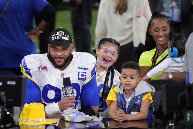 Los Angeles Rams defensive end Aaron Donald (99) is interviewed with his wife Erica Donald 