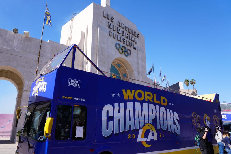 A bus with Los Angeles Rams World Champions signage is seen during Super Bowl LVI championship rally at the Los Angeles Memorial Coliseum on Feb. 16, 2022. 