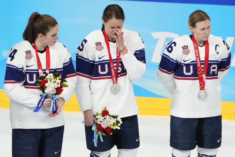 Team United States forward Dani Cameranesi (24), Team United States forward Alex Carpenter (25), and Team United States forward Kendall Coyne Schofield (26) stand on the ice